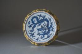 明宣德 黄釉青花内外底龙戏珠纹十棱葵瓣式洗